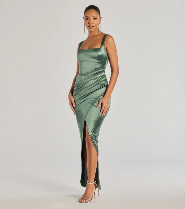 Turn heads at Prom 2025 in this sage green prom dress, where statement-making details meet the iconic style of the Rebecca Satin Slim-Fit Formal Dress .