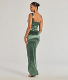 The elegant Rebecca Satin Slim-Fit Formal Dress is a sage green satin bridesmaid dress crafted with luxe fabric, ideal for modern weddings and traditional bridal parties.