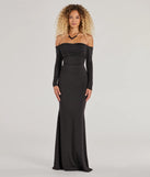 Turn heads at Prom 2025 in this black prom dress, where statement-making details meet the iconic style of the Haven Knit Off-The-Shoulder Lace-Up Mermaid Dress .
