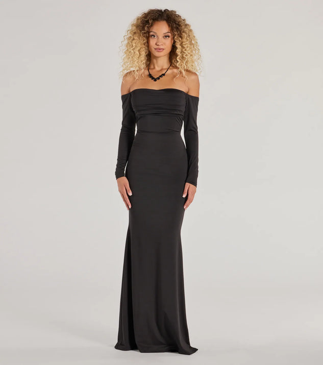 Turn heads at Prom 2025 in this black prom dress, where statement-making details meet the iconic style of the Haven Knit Off-The-Shoulder Lace-Up Mermaid Dress .
