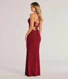 Make a statement in the Rae Lace-Up Glitter Mermaid Dress in wine, a bold red prom dress designed to exude confidence, elegance, and a striking prom-night look.
