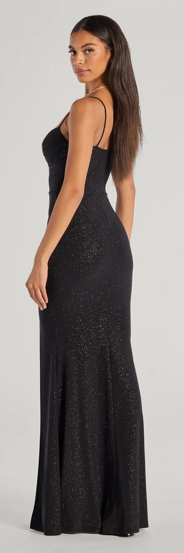 The Astrid High-Slit Glitter Mermaid Dress is a show-stopping black prom dress, offering a sleek, slimming silhouette that enhances your natural beauty for an unforgettable night.