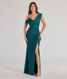 Turn heads at Prom 2025 in this hunter green prom dress, where statement-making details meet the iconic style of the Cynthia One-Shoulder Cowl Neck Mermaid Dress .