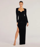 Turn heads at Prom 2025 in this black prom dress, where statement-making details meet the iconic style of the Kienna Long Sleeve Velvet Mermaid Dress .