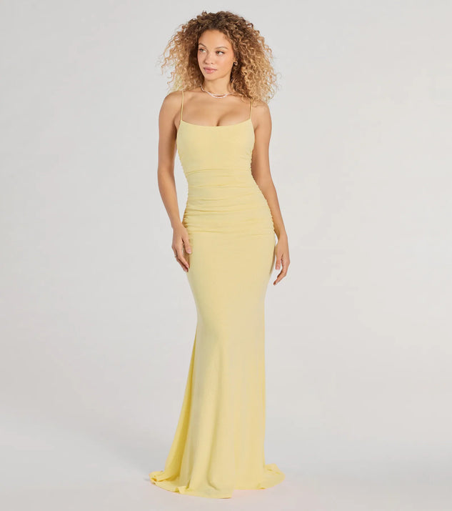 Turn heads at Prom 2025 in this yellow prom dress, where statement-making details meet the iconic style of the Rowan Formal Glitter Ruched Mermaid Dress .