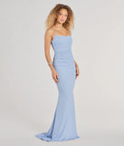 Step into the Prom 2025 dance in the Rowan Formal Glitter Ruched Mermaid Dress in light blue, a stunning blue prom dress designed to complement any theme with its timeless allure and statement-making style.
