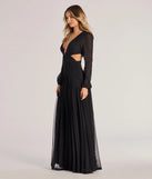 The Adley Long Sleeve Cutout Mesh Formal Dress in luxe black fabric, a stunning prom dress with statement details designed to make a bold impression at Prom 2025.