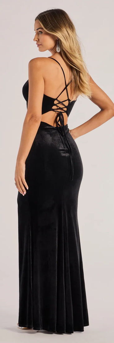 The April Lace-Up Velvet Corset Mermaid Dress is a show-stopping black prom dress, offering a sleek, slimming silhouette that enhances your natural beauty for an unforgettable night.