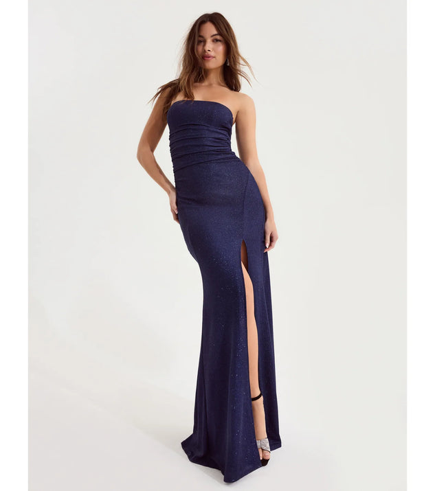 Turn heads at Prom 2025 in this denim prom dress, where statement-making details meet the iconic style of the Lilly Sleeveless High-Slit Glitter Slim Dress .