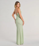 The Molly Lace-Up Mermaid Glitter Formal Dress in sage is a stunning green prom dress designed to capture attention with its fresh or bold color and effortlessly stylish silhouette.