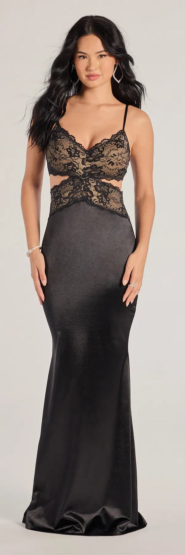 Turn heads at Prom 2025 in this black prom dress, where statement-making details meet the iconic style of the Aliana Cutout Lace And Satin Mermaid Dress .