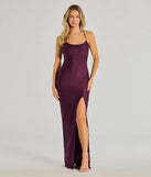 Turn heads at Prom 2025 in this plum prom dress, where statement-making details meet the iconic style of the Natalie Cowl Neck Lace Up Slit Formal Dress .