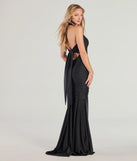 The Denise Halter Tie-Back Mermaid Formal Dress is a show-stopping black prom dress, offering a sleek, slimming silhouette that enhances your natural beauty for an unforgettable night.