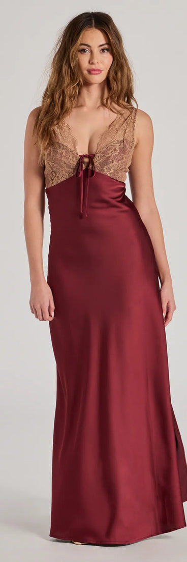 Turn heads at Prom 2025 in this burgundy prom dress, where statement-making details meet the iconic style of the Deirdre Satin and Lace Sleeveless Mermaid Dress .