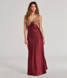 Turn heads at Prom 2025 in this burgundy prom dress, where statement-making details meet the iconic style of the Deirdre Satin and Lace Sleeveless Mermaid Dress .