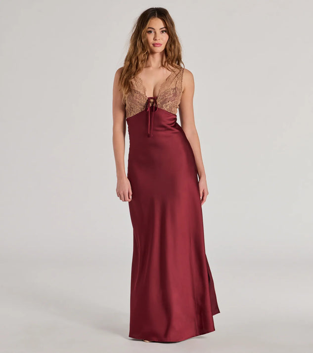 Turn heads at Prom 2025 in this burgundy prom dress, where statement-making details meet the iconic style of the Deirdre Satin and Lace Sleeveless Mermaid Dress .