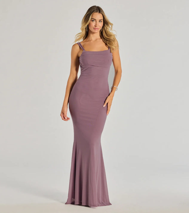 Turn heads at Prom 2025 in this lavender prom dress, where statement-making details meet the iconic style of the Mishka Strappy Open Back Mesh Mermaid Formal Dress .