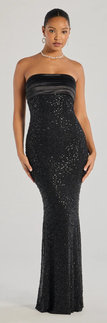 Turn heads at Prom 2025 in this black prom dress, where statement-making details meet the iconic style of the Stacey Strapless Sequin Beaded Mermaid Dress .