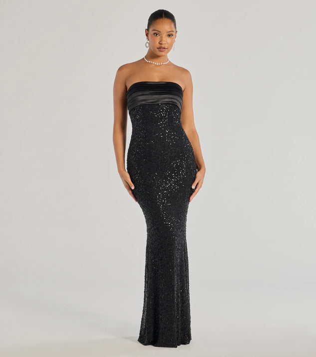 Turn heads at Prom 2025 in this black prom dress, where statement-making details meet the iconic style of the Stacey Strapless Sequin Beaded Mermaid Dress .