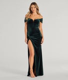 Turn heads at Prom 2025 in this hunter green prom dress, where statement-making details meet the iconic style of the Aubrielle Off The Shoulder Corset Velvet Mermaid Dress .