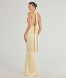 The Erika Halter Satin Column Formal Dress in luxe yellow fabric, a stunning prom dress with statement details designed to make a bold impression at Prom 2025.