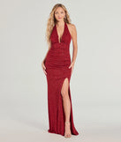 Turn heads at Prom 2025 in this red prom dress, where statement-making details meet the iconic style of the Gretchen Halter Slit Slim Glitter Formal Dress .