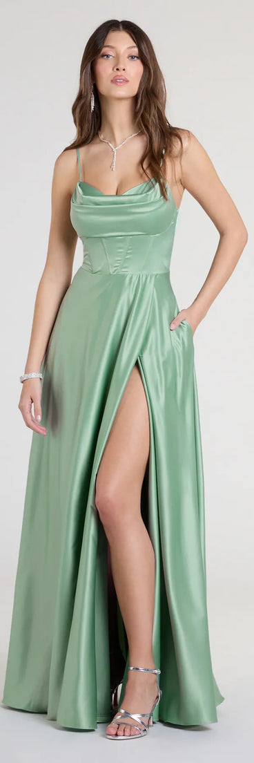 Own the spotlight in the Marcella A-Line Slit Satin Formal Dress, a sage green formal dress crafted to deliver luxe style for autumn weddings, Military Balls, or any special event.