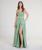 Turn heads at Prom 2025 in this sage green prom dress, where statement-making details meet the iconic style of the Marcella A-Line Slit Satin Formal Dress.