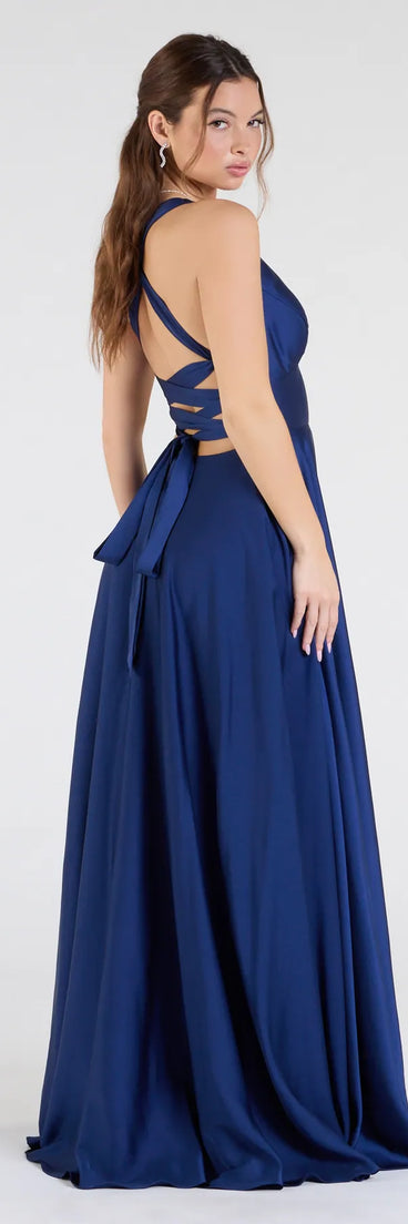 Step into the Prom 2025 dance in the Abbey Lace-Up Slit A-Line Satin Formal Dress in navy, a stunning blue prom dress designed to complement any theme with its timeless allure and statement-making style.
