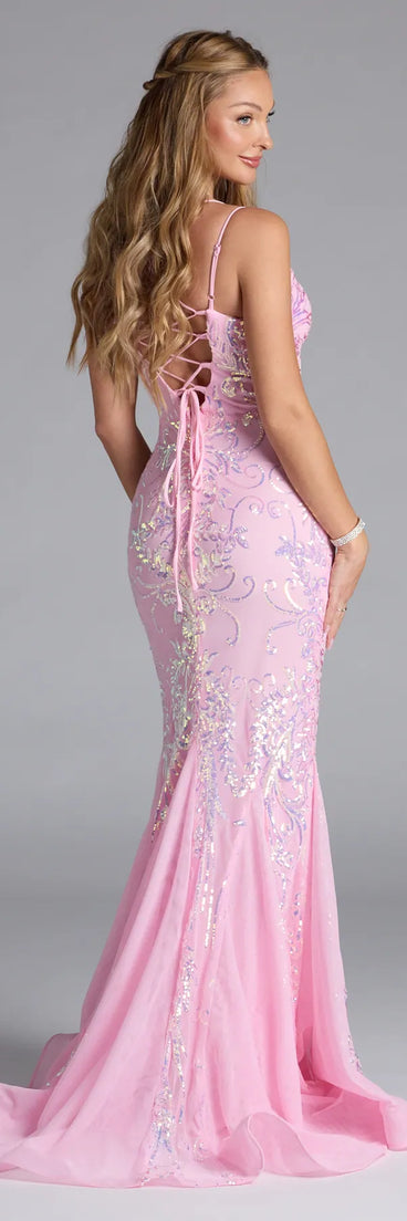 Turn heads at Prom 2025 in this pink prom dress, where statement-making details meet the iconic style of the Makayla Lace-Up Mermaid Sequin Formal Dress.