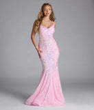 Turn heads at Prom 2025 in this pink prom dress, where statement-making details meet the iconic style of the Makayla Lace-Up Mermaid Sequin Formal Dress.