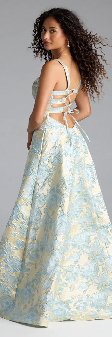 Turn heads at Prom 2025 in this blue prom dress, where statement-making details meet the iconic style of the Lulabelle Lace-Up Slit A-Line Formal Dress.