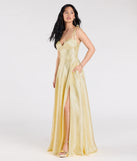 Turn heads at Prom 2025 in this yellow prom dress, where statement-making details meet the iconic style of the Melika Bustier Slit A-Line Satin Formal Dress.