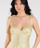 Turn heads at Prom 2025 in this yellow prom dress, where statement-making details meet the iconic style of the Melika Bustier Slit A-Line Satin Formal Dress.