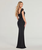 The Blossom Formal Halter Mermaid Dress is a show-stopping black prom dress, offering a sleek, slimming silhouette that enhances your natural beauty for an unforgettable night.