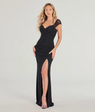 The Blossom Formal Halter Mermaid Dress in luxe black fabric, a stunning prom dress with statement details designed to make a bold impression at Prom 2025.
