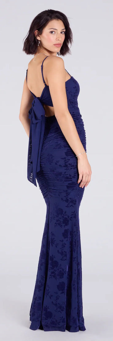 Make a bold statement in the Jaymie Tie-Back Floral Velvet Mermaid Formal Dress in navy blue, the perfect fall dress for weddings, cocktail hours, nights out, and/or seasonal celebrations.