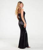 The Caitlin Sequin Applique Slit Mermaid Satin Formal Dress is a show-stopping black prom dress, offering a sleek, slimming silhouette that enhances your natural beauty for an unforgettable night.