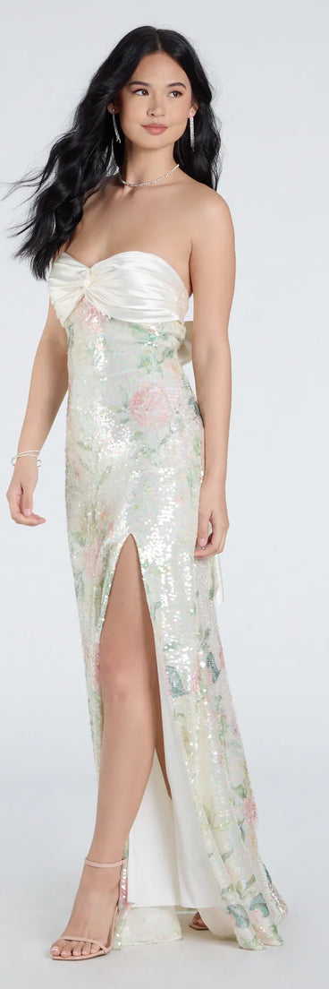 Make a bold statement in the Angelina Satin Tie-Back Floral Sequin Formal Dress in ivory, the perfect spring dress for weddings, cocktail hours, nights out, and/or seasonal celebrations.