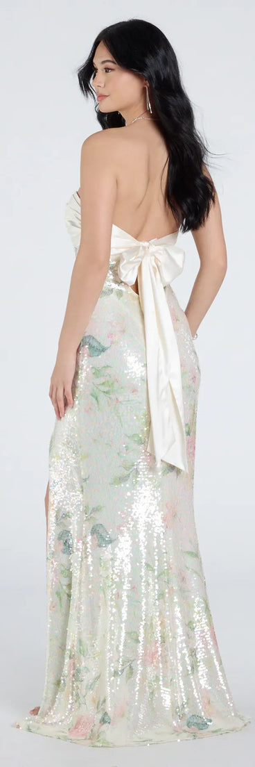 Make a bold statement in the Angelina Satin Tie-Back Floral Sequin Formal Dress in ivory, the perfect spring dress for weddings, cocktail hours, nights out, and/or seasonal celebrations.