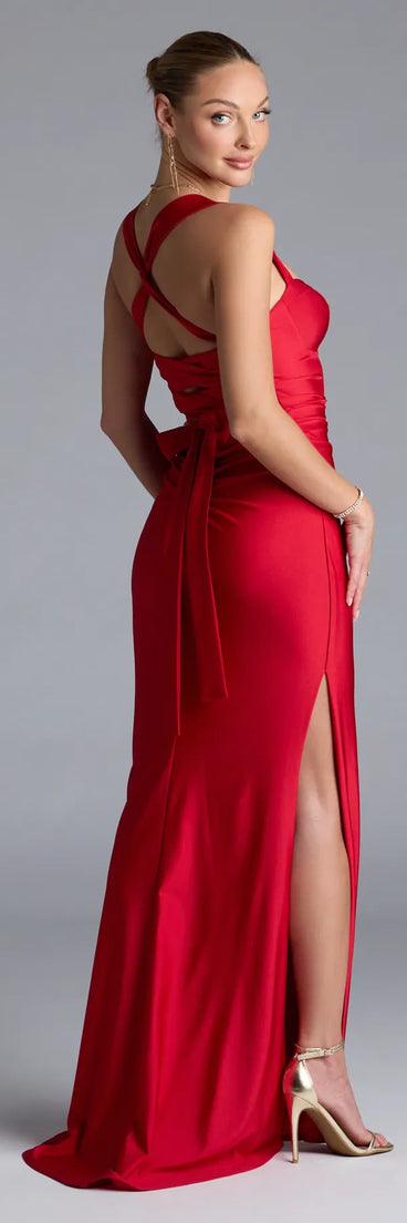 Turn heads at Prom 2025 in this red prom dress, where statement-making details meet the iconic style of the Whitney Lace-Up Slit Formal Dress.