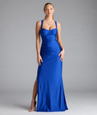 Turn heads at Prom 2025 in this royal blue prom dress, where statement-making details meet the iconic style of the Whitney Lace-Up Slit Formal Dress.