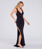 Own the spotlight in the Ayla Lace-Up Slit Mermaid Glitter Formal Dress, a black formal dress crafted to deliver luxe style for summer weddings, Army Balls, or any special event.