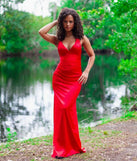 Turn heads at Prom 2025 in this red prom dress, where statement-making details meet the iconic style of the Jamie Lace-Up Satin Formal Column Dress.