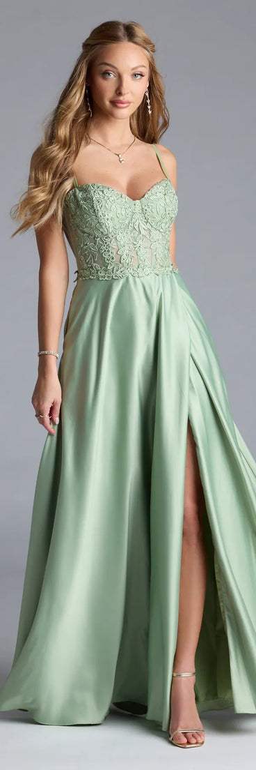 Own the spotlight in the Antonina Sweetheart Corset A-Line Satin Formal Dress, a sage green formal dress crafted to deliver luxe style for autumn weddings, Military Balls, or any special event.