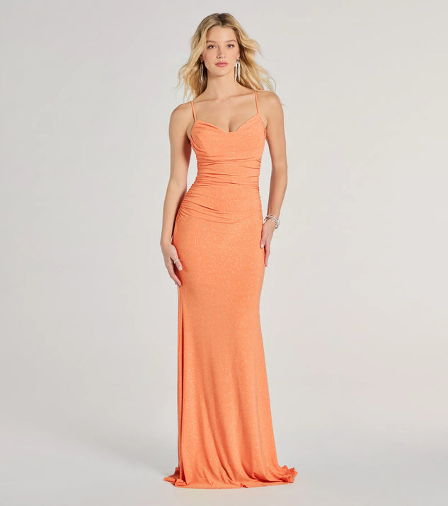 Turn heads at Prom 2025 in this orange prom dress, where statement-making details meet the iconic style of the Patricia Cowl Neck Bodycon Glitter Formal Dress .