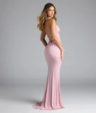 Turn heads at Prom 2025 in this pink prom dress, where statement-making details meet the iconic style of the Dolly Lace-Up Slit Mermaid Glitter Formal Dress.