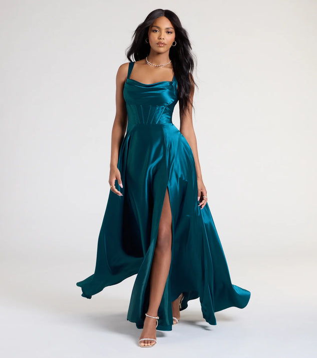 Own the spotlight in the Lelia Cowl Neck Slit A-Line Satin Formal Dress, a teal formal dress crafted to deliver luxe style for summer weddings, Army Balls, or any special event.