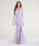 Turn heads at Prom 2025 in this lavender prom dress, where statement-making details meet the iconic style of the Cadie Halter Corset Slit Lace Formal Dress.