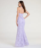 Turn heads at Prom 2025 in this lavender prom dress, where statement-making details meet the iconic style of the Cadie Halter Corset Slit Lace Formal Dress.